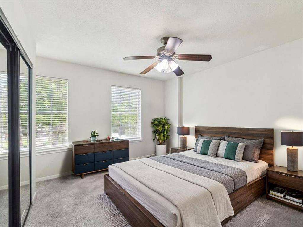 BEDROOM 3 ROOM FEATURING OVERSIZED WINDOWS AND GLASS SLIDING DOOR. **This room has been virtually staged.