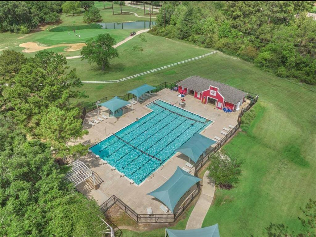 Tennis courts by the community pool