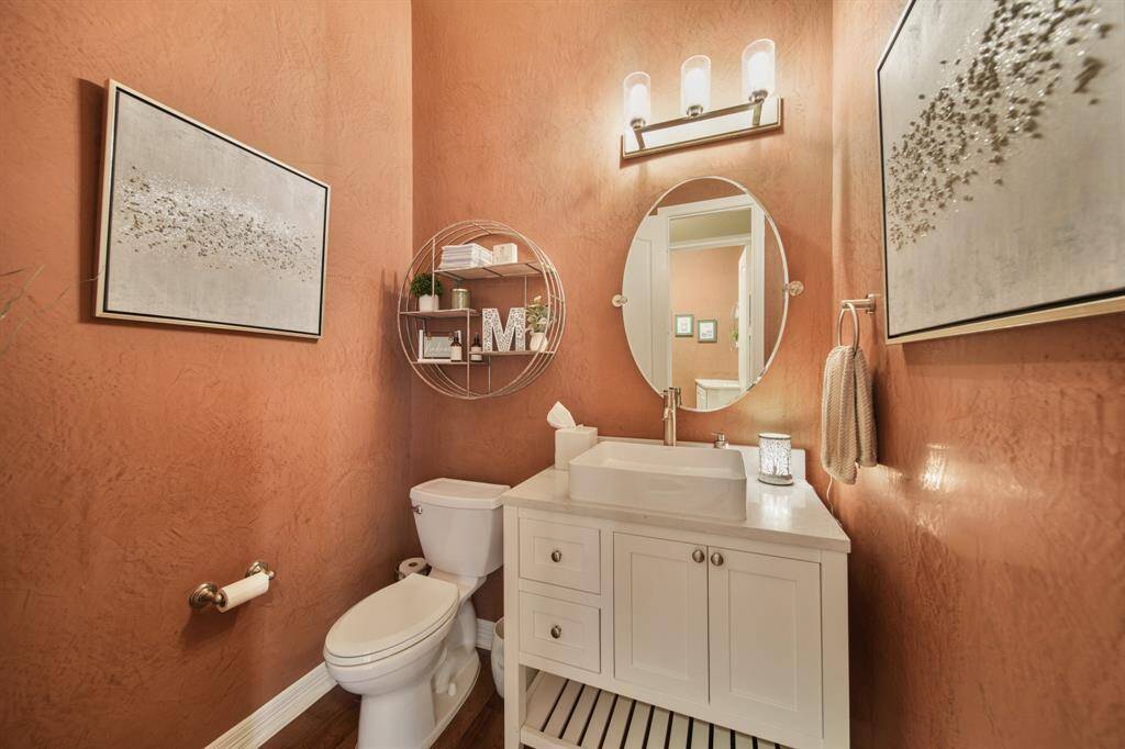 Primary Suite with impressive architectural accent wall.