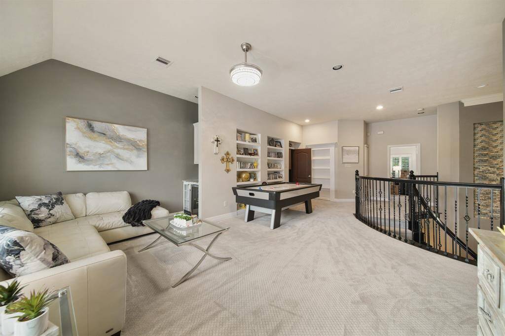Enjoy your expansive backyard retreat with additional refriderators, TV and space for entertaining.