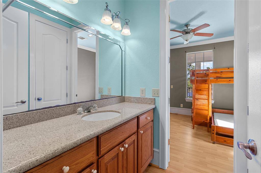 Convenient upstairs utility space with ample storage and natural light. Perfect for organizing household essentials.