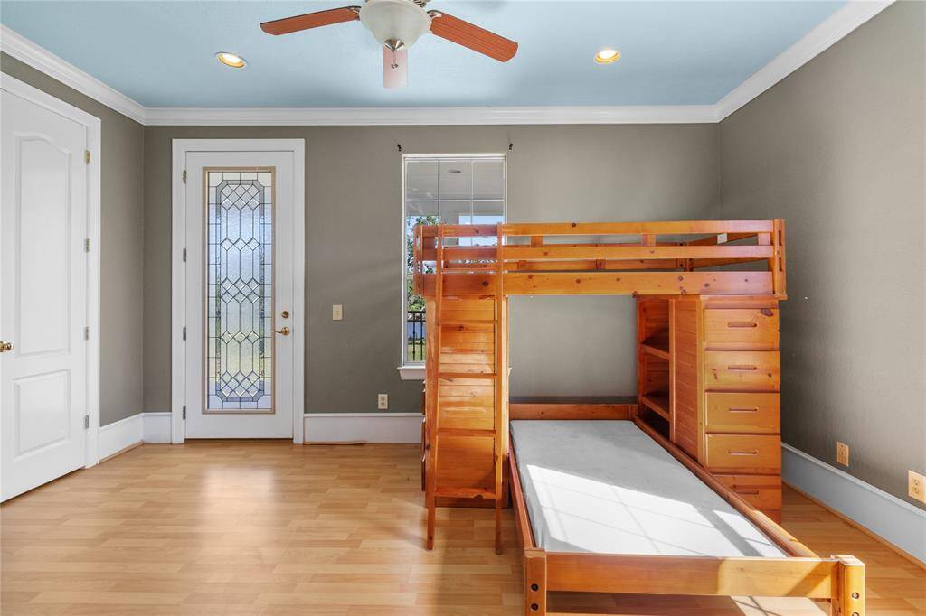 Charming upstairs bathroom featuring a spacious vanity, elegant lighting, and modern fixtures. Ideal for comfort and convenience.