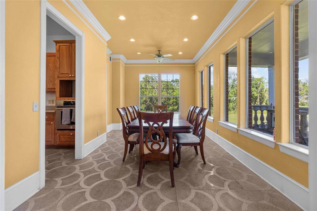 Breathtaking aerial view showcasing a serene riverside property surrounded by lush greenery—perfect for those seeking tranquility and natural beauty.