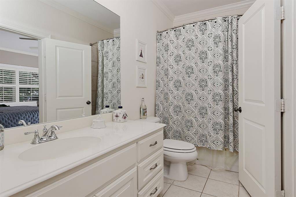 First floor bathroom convenient to Guest Room and Home Office.