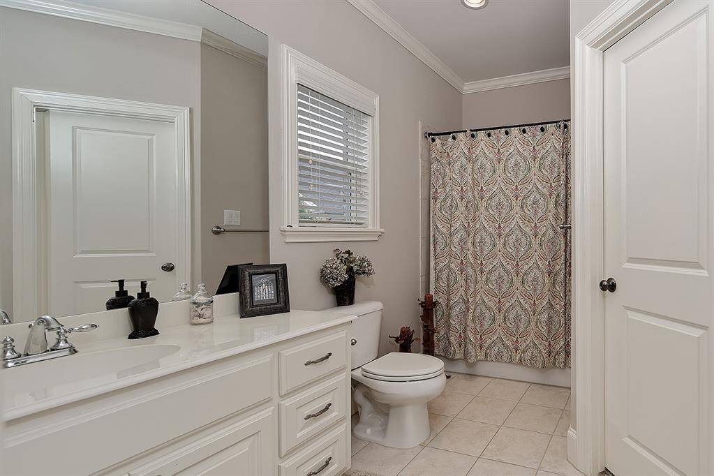 Bathroom 2 has great storage and counter-space. Window allows natural light another great feature.