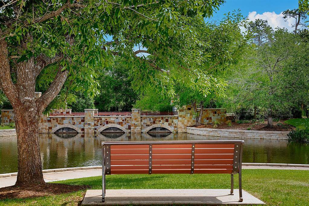 This picturesque setting with mature oak trees, pond and park setting is literally across the street from the Brownstone.