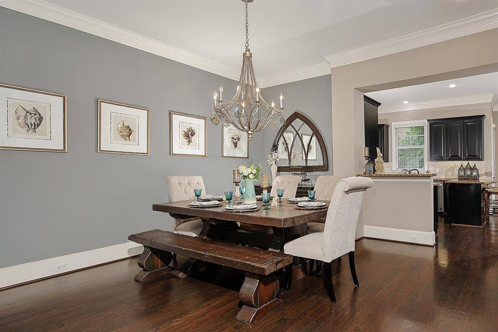 The open layout flows seamlessly into kitchen, perfect for entertaining.