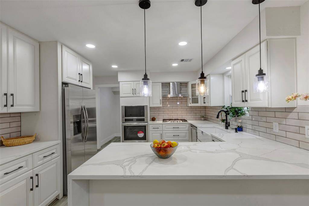 Welcome to this beautifully newly renovated home 7707 12th Fairway Ln in Humble, Texas!