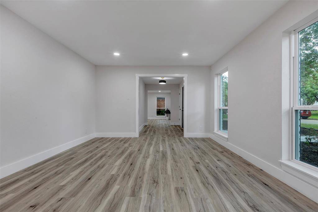 Expansive family room can be used as home office /study or a game room downstairs.