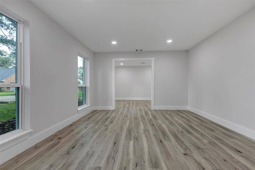 Expansive family room can be used as home office /study or downstairs game room.