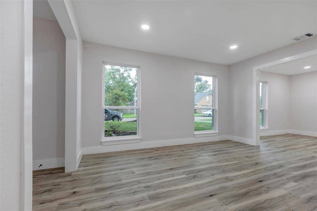 Expansive family room can be used as home office /study or downstairs game room.