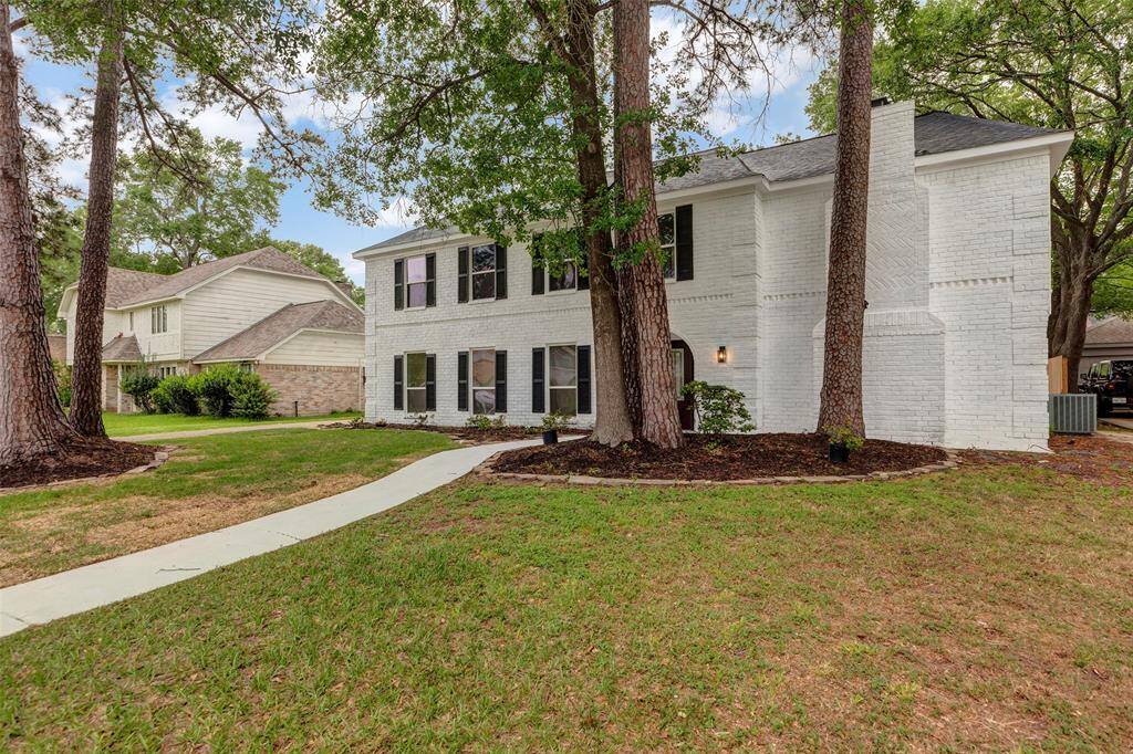 2856 square foot home featuring four bedrooms 2.5 bathrooms, a formal dining, living room, family room and game room.