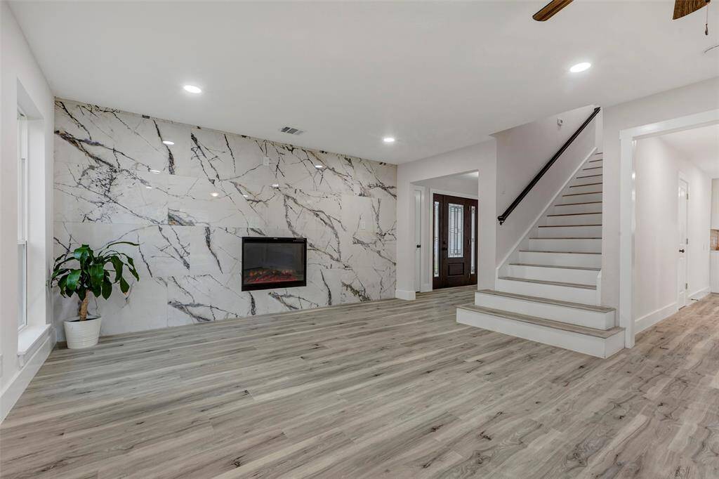 Spacious living room with a lovely electric fireplace for a few freezing days in the winter!
