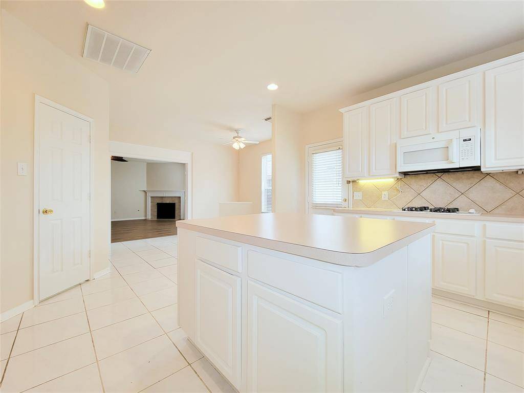 Ton of counter space &  very functional work space/island.