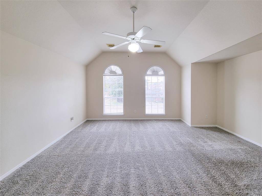 Large Primary Bedroom with sitting area & T.V. nook. This is located on second floor.