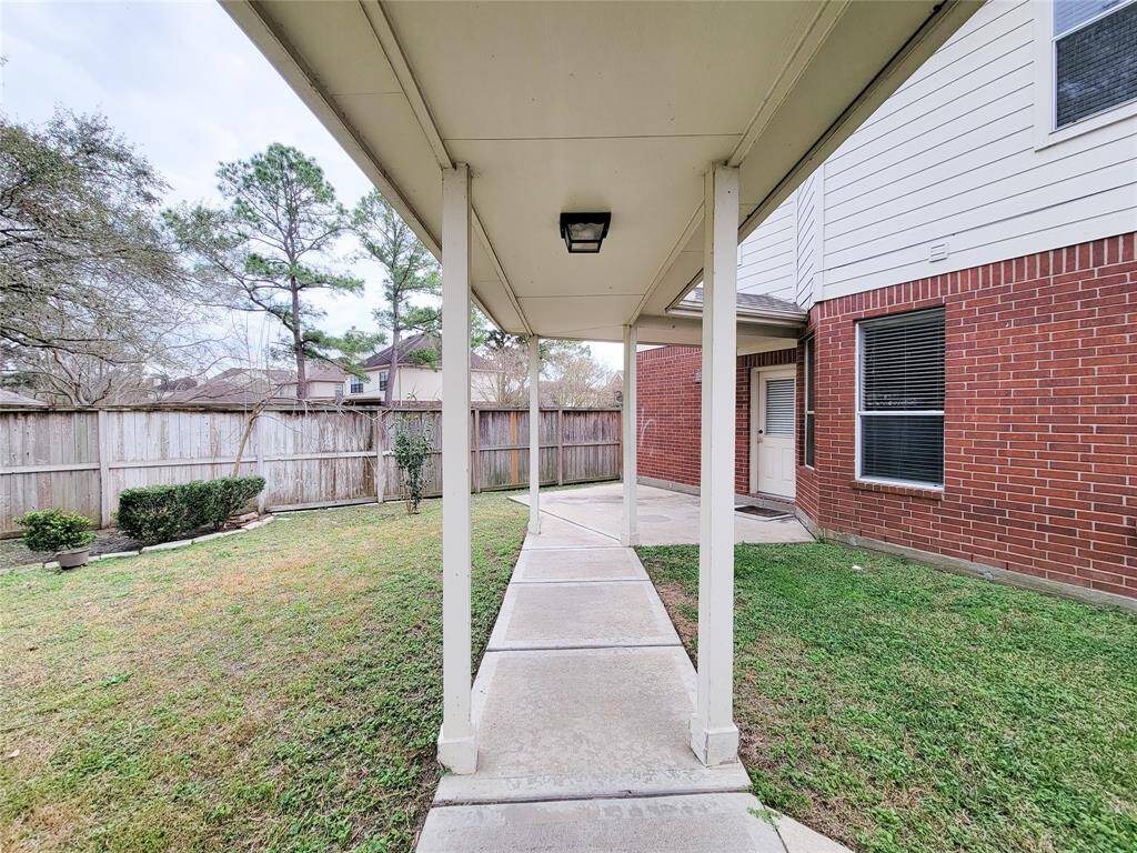 Another view.  Also detached Garage with extra 10 feet extension ( great for storage, bike ect).