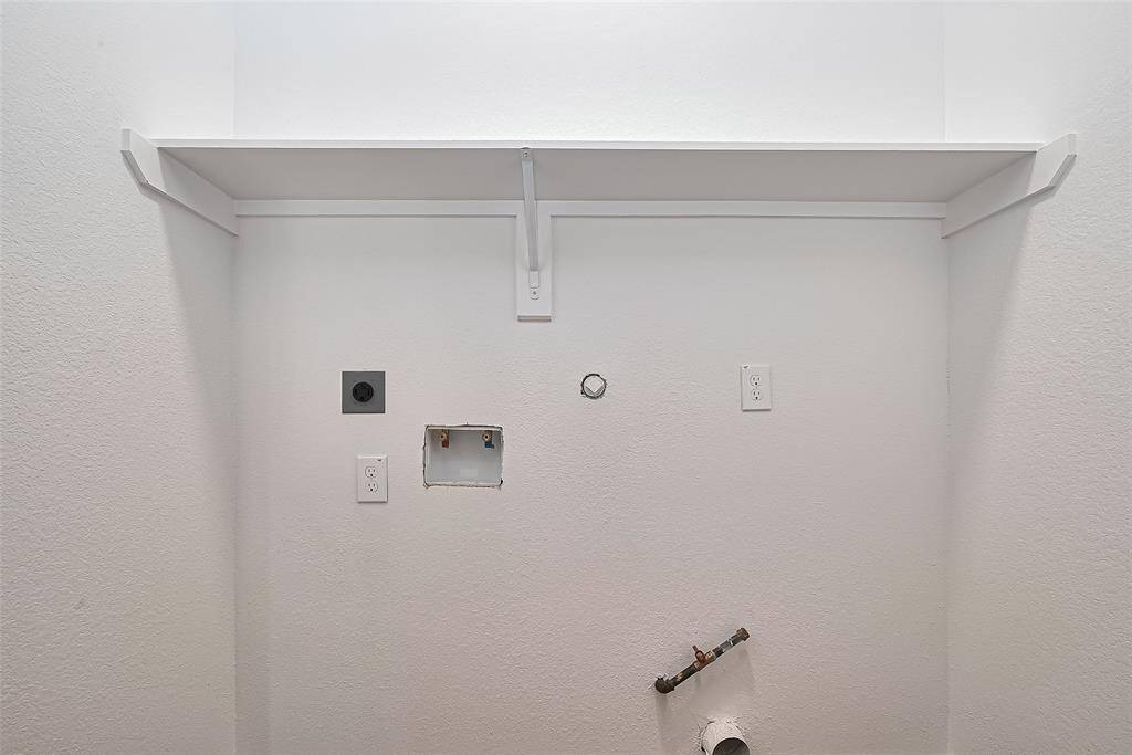 Dedicated Laundry Area with Storage ShelfEnjoy the convenience of an upstairs laundry room equipped with full utility hookups and a built-in upper shelf for extra storage. This bright, functional space makes laundry day a breeze—tucked neatly out of the way but always within reach.