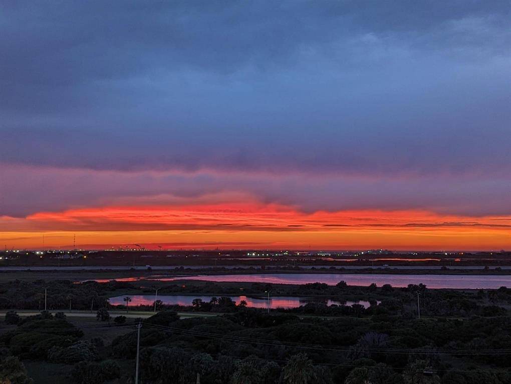 Cotton candy sunsets off the bay front balcony are just lovely ! This unit includes patio furniture!