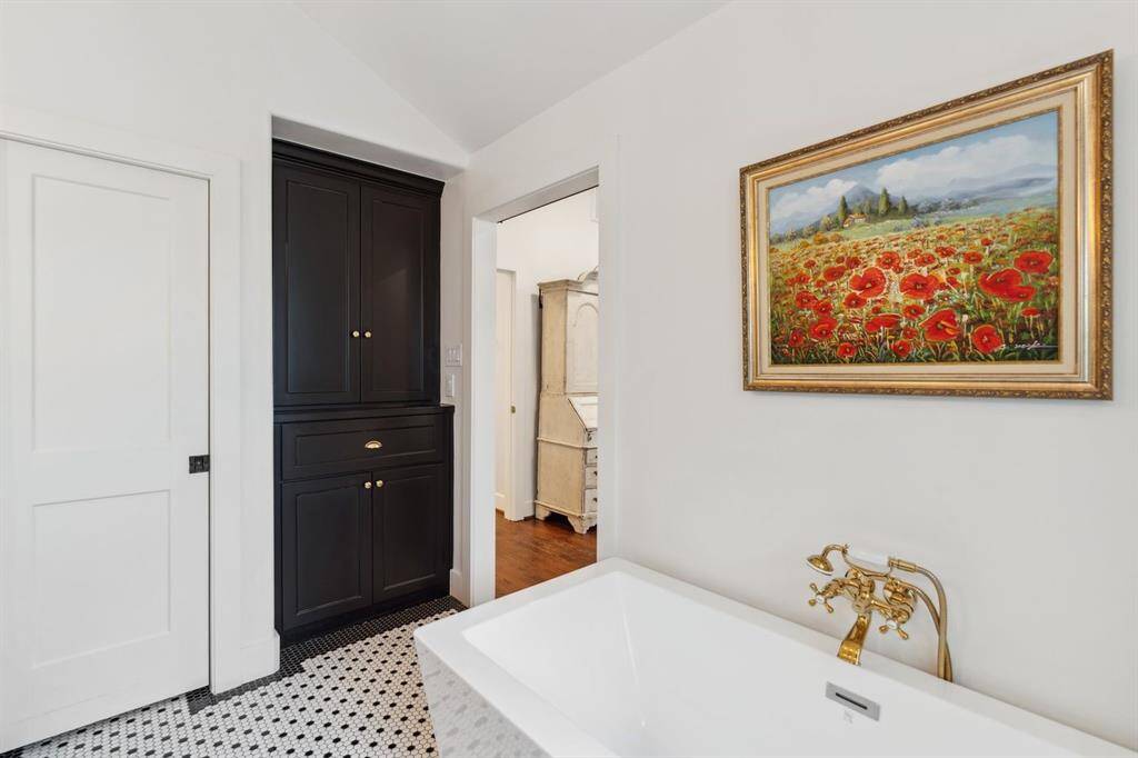 Built in storage in the bathroom for keeping linens and personal items organized.