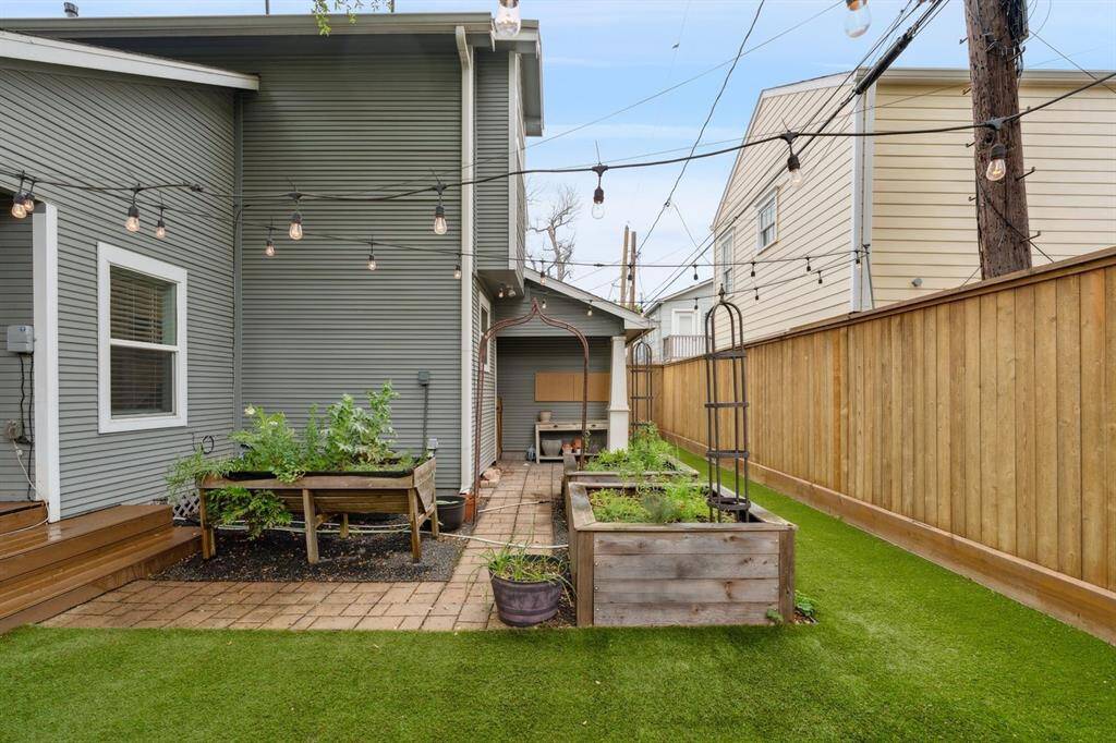 Easy to maintain turfed backyard so you can focus on this incredible garden!