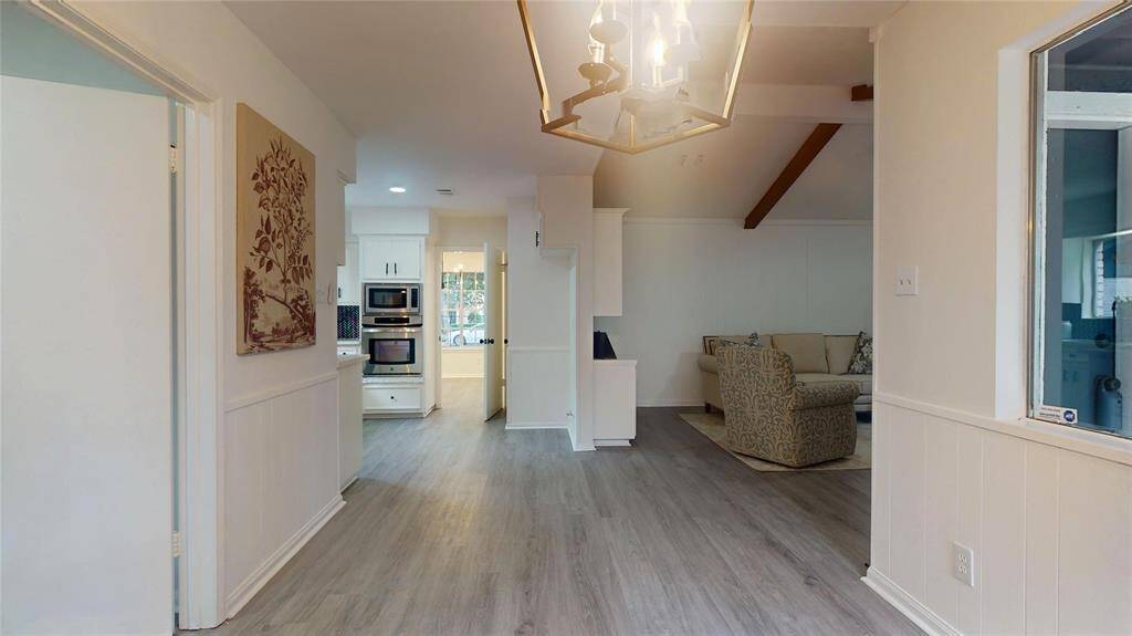 Here's another view of the layout kitchen/breakfast/living area... straight ahead is the formal dining room!
