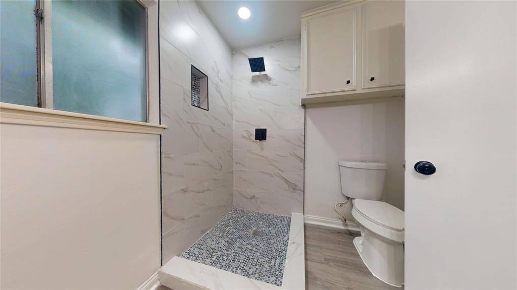 Another view of the primary bath with its extra large shower!