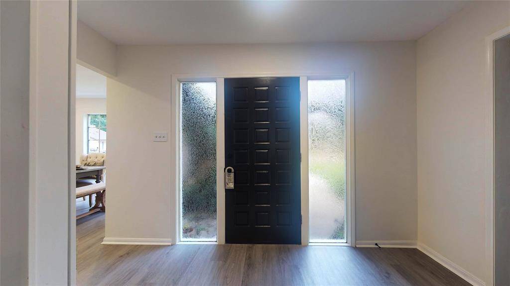 A large entryway welcomes you into this nice property...