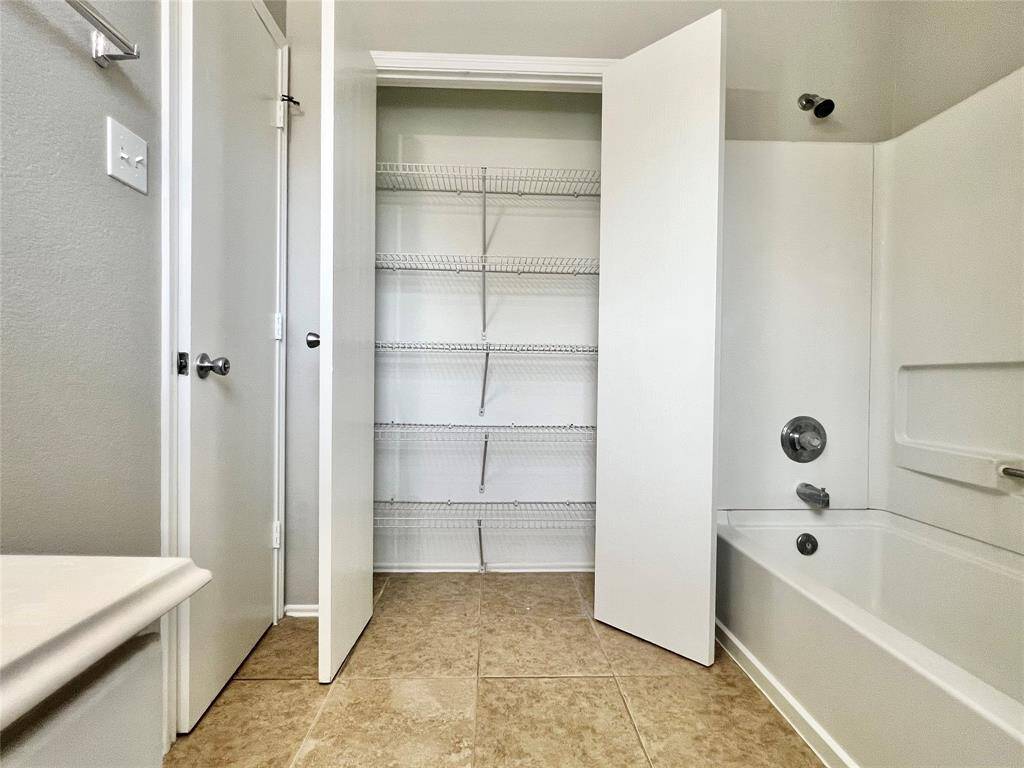 UPSTIRAIRS HALL BATHROOM LINEN CLOSET