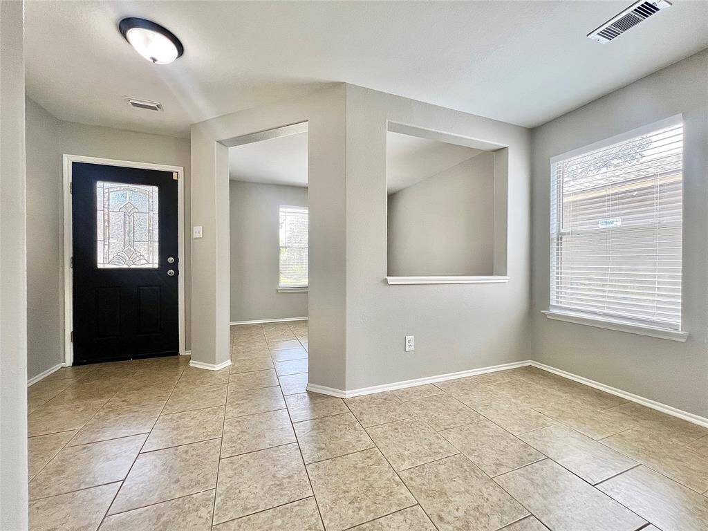 ENTRANCE PLUS THE STUDY/HOBBY ROOM