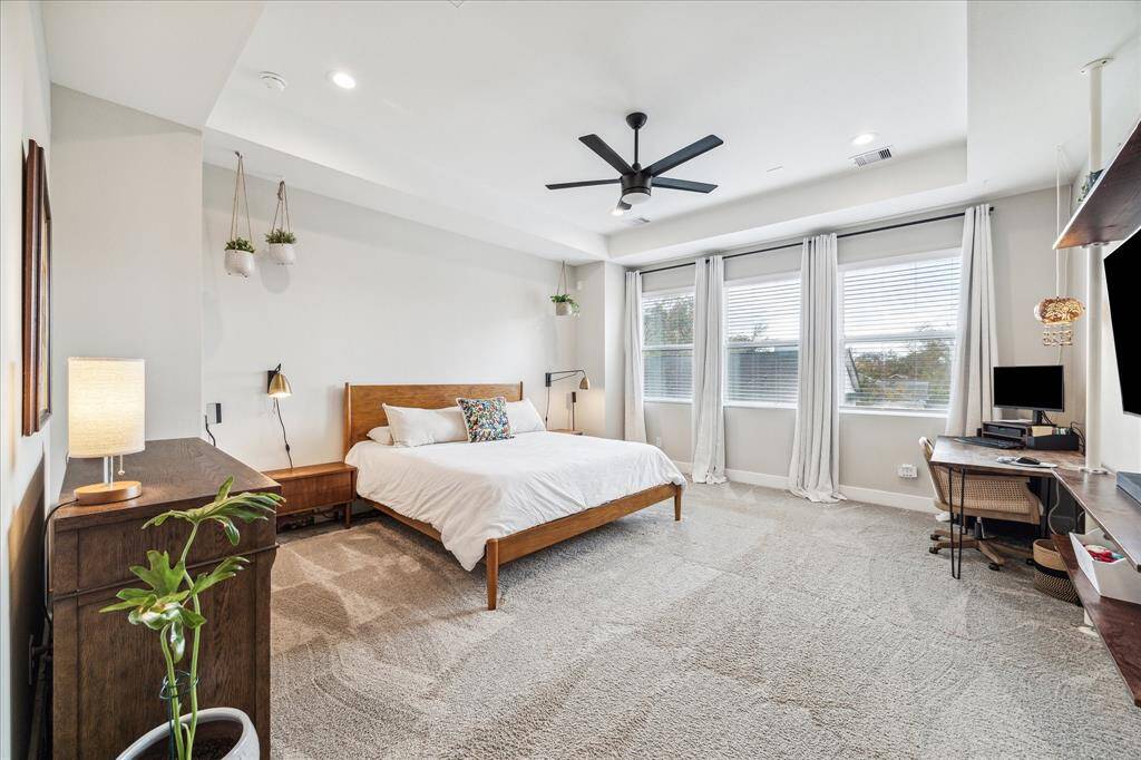 Large primary bedroom with downtown views.