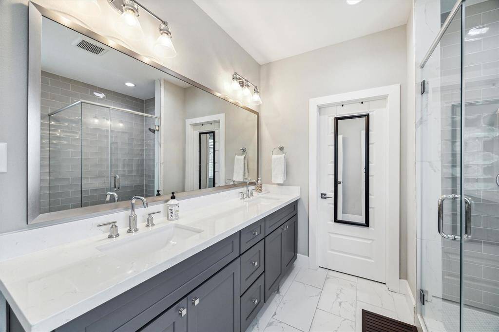 Dual sink with plenty of counter top space. A very large walk in closet as well.