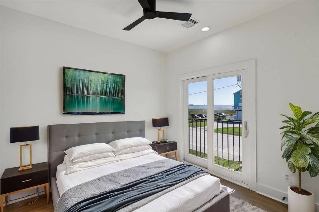 One of the two secondary bedrooms providing a comfortable and stylish space perfect for guests or family members