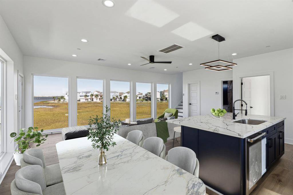 Look out over the bay while enjoying your meals in this stunning dining area offering picturesque views