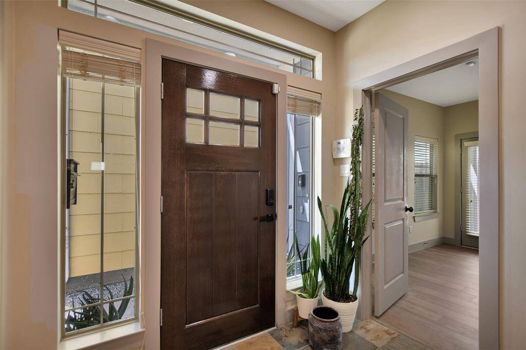 Foyer. As you enter the home there is one bedroom with its full bathroom on the first floor with access to the backyard.