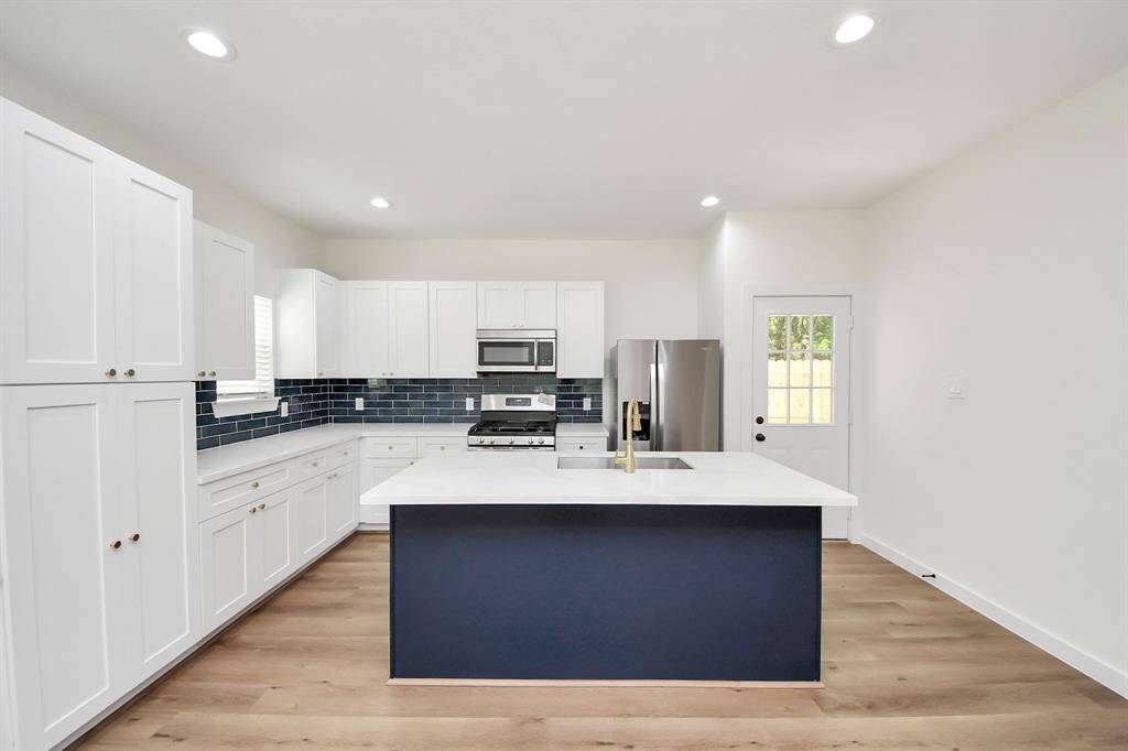 luxury kitchen with backyard door
