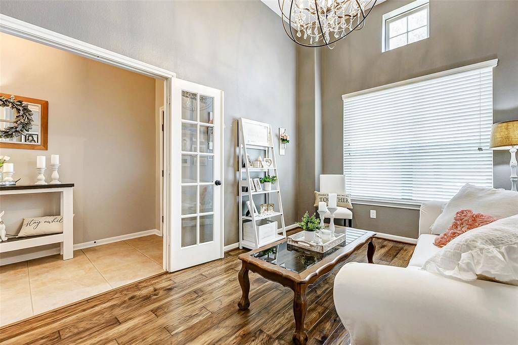 Gorgeous french doors and high ceiling