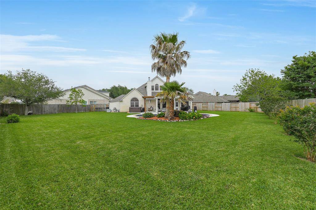 This expansive lot has ample space beyond the pool for whatever your outdoor needs may be.
