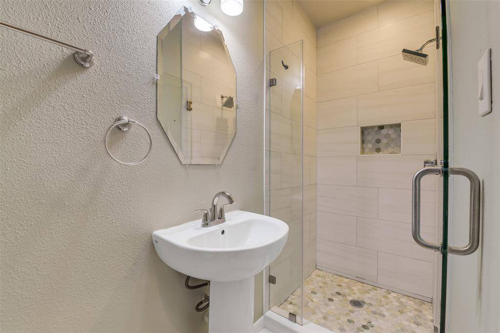 The bathroom upstairs was remodeled to include a shower.