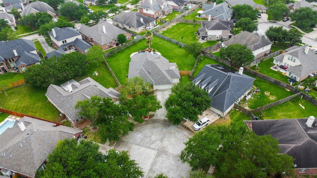 This home is nestled in a quiet and tight-knit cul-de-sac. The brand new roof was just installed this April!