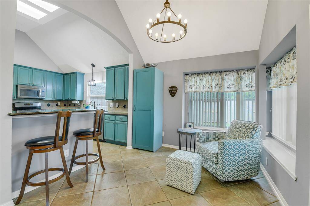 The breakfast room is the perfect place to grab a cup of coffee and enjoy backyard views.