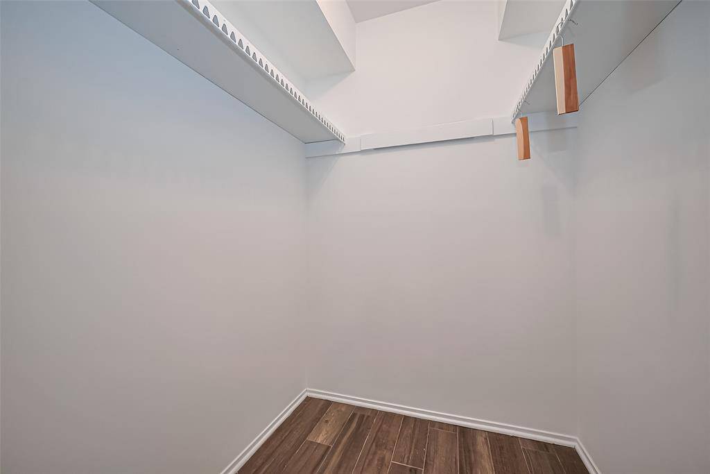 With built-in shelving and hanging space, this closet is a dream storage solution for any wardrobe.