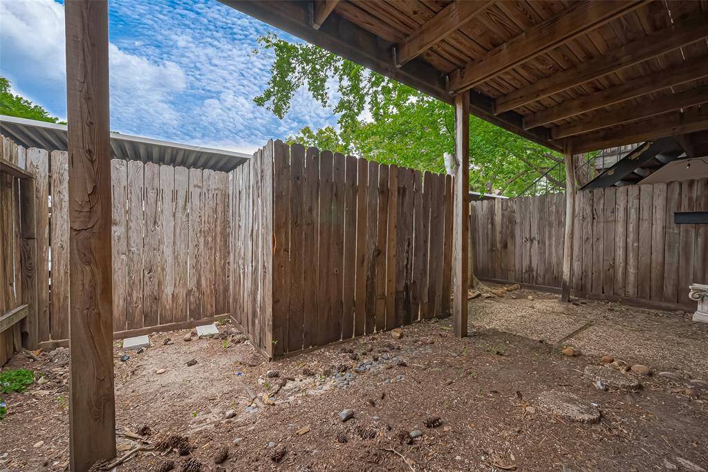 The fully fenced backyard offers added privacy and security—perfect for pets, container gardening, or simply enjoying your own peaceful outdoor space.