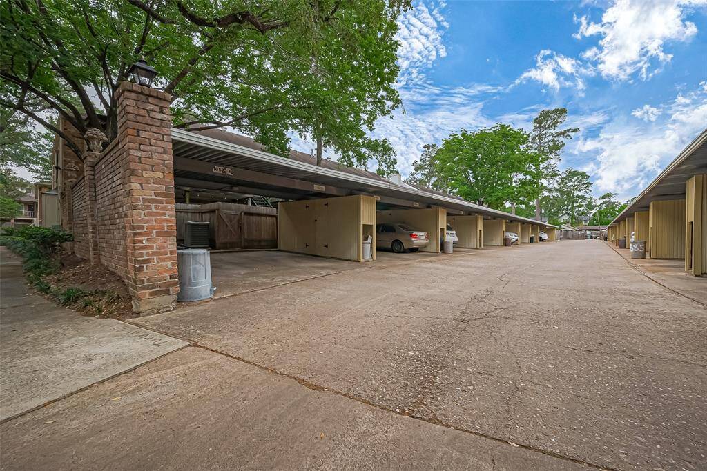 Enjoy the convenience of an assigned carport with a private storage area, located directly behind your back gate for easy access and added functionality.