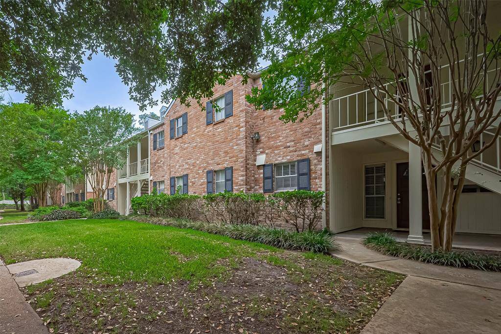 This lovely home welcomes you with timeless charm, featuring a classic brick exterior, stylish shutters, and well-maintained landscaping that adds to its warm curb appeal.