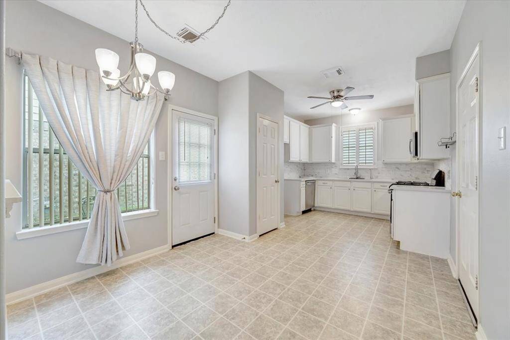 Dining area opens into kitchen.