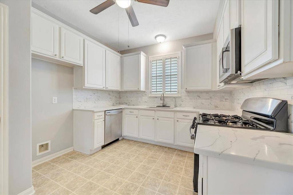 Notice the stainless steel appliances.