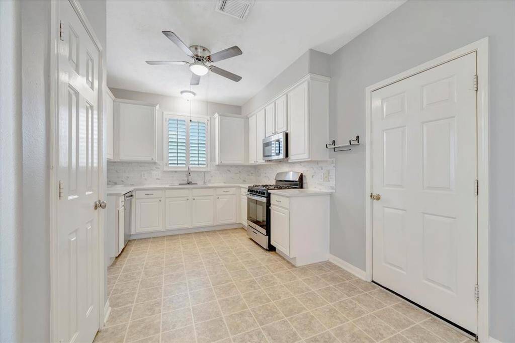 Tons of counter space and cabinets.