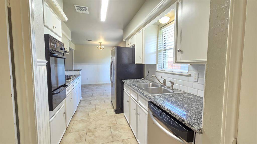 Enjoy cooking in this kitchen, where you can easily access the formal living and dining room, breakfast area, den, backyard, and even the garage. You’ll never feel left out while preparing meals—everything flows seamlessly, keeping you connected to the rest of the home.