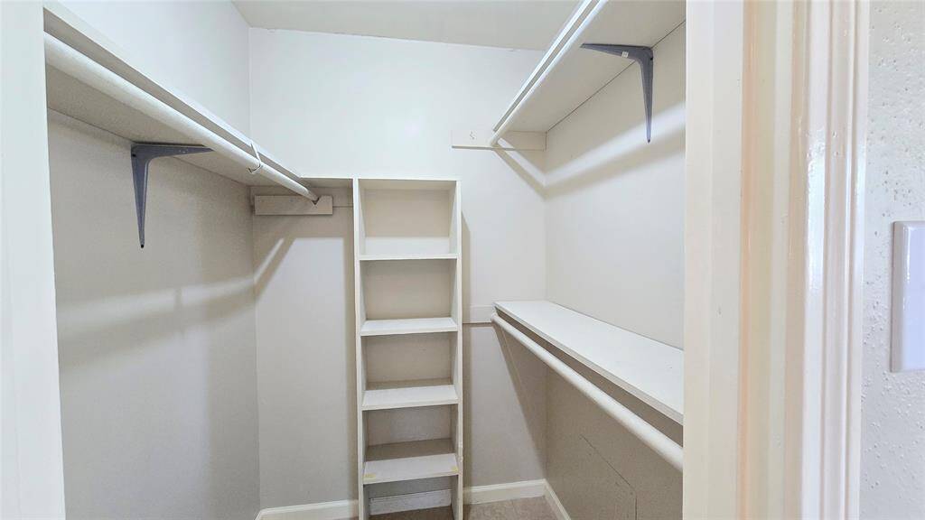 The walk-in closet offers generous space to keep everything organized—perfect for your daily wardrobe, seasonal storage, or even a stylish dressing area.