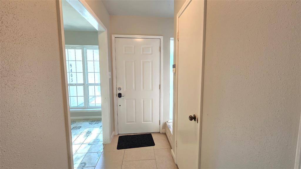 The inviting entryway sets the tone for the home, offering a warm welcome as you step inside.